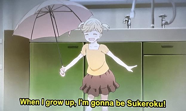 Small girl holding an umbrella. Subtitles read, “When I grow up, I’m gonna be Sukeroku!”