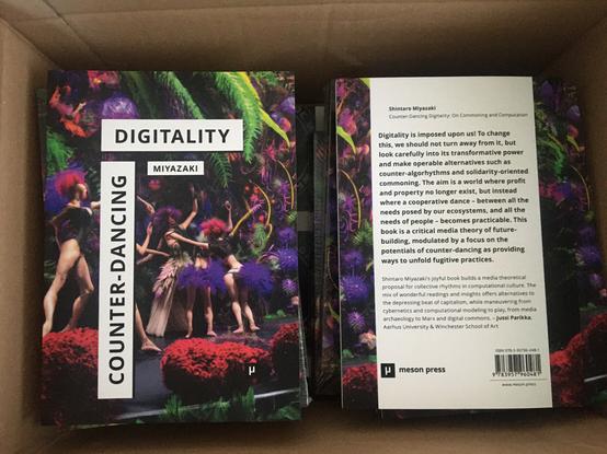A box of copies of “Counter-Dancing Digitality. On Commoning and Computation” by Shintaro Miyazaki.