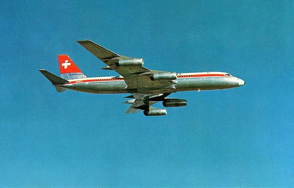 plane flying high with out clouds.