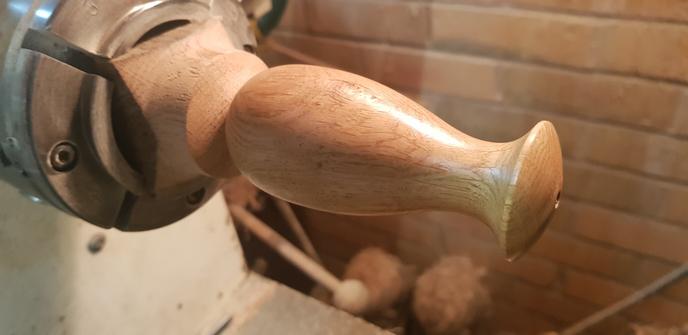 Shiny oiled and polished light pull made from the filthy old piece of oak.
