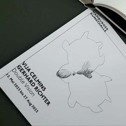 Photograph of a drawing of two intersecting outlines of The Vogt on a paper from the exhibition Double Vision.