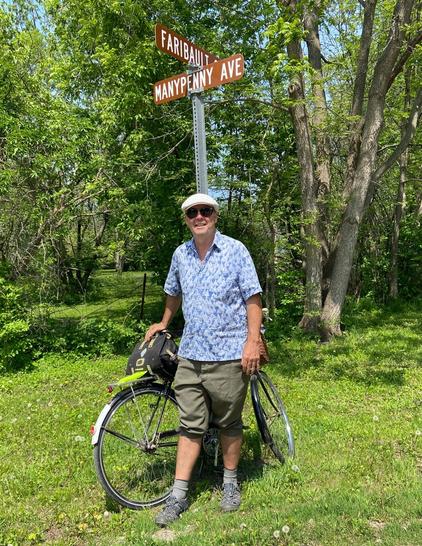An old man and his 1961 English Three Speed bicycle at the corner of Faribault and Manypenny, Old Frontenac, Minnesota