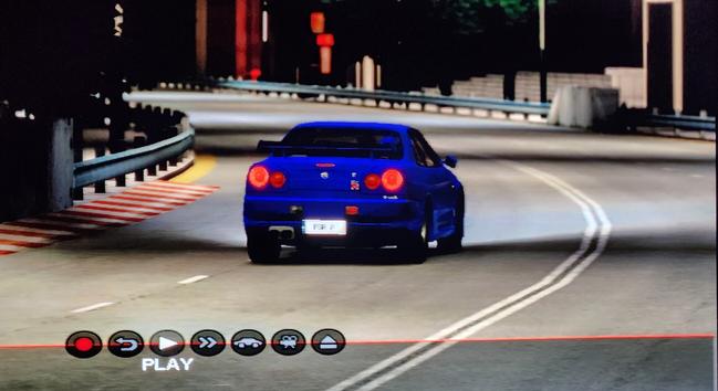 Screenshot depicting a blue Nissan Skyline R34