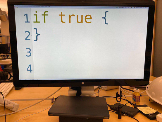 A computer screen, showing a code block with a if-statement that just says "if true", its font size is very large, so its a big if true