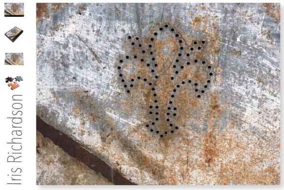 Florence Italy flour design in metal. The metal is rusty around the fleur design.