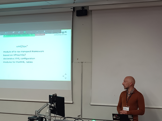 Martin presenting a slide “xml2tex” with the bullet points: Module of le-tex transpect framework; based on XProc/XSLT; Declarative XML configuration; Modules for MathML and tables