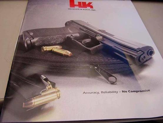 world-famous blooper of aHK brochure with a loaded handgun magazine, but the rounds are loaded in backwards, so the magazine and gun won't work at all!