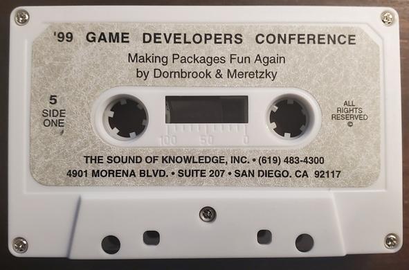A cassette tape labeled "99 Game Developers Conference, Making Packages Fun Again by Dornbrook & Meretzky"