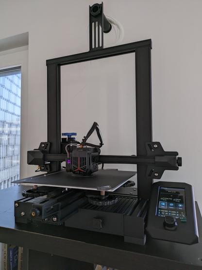 Photo of a new Creality Ender V2 Neo 3D printer starting to print benchy.