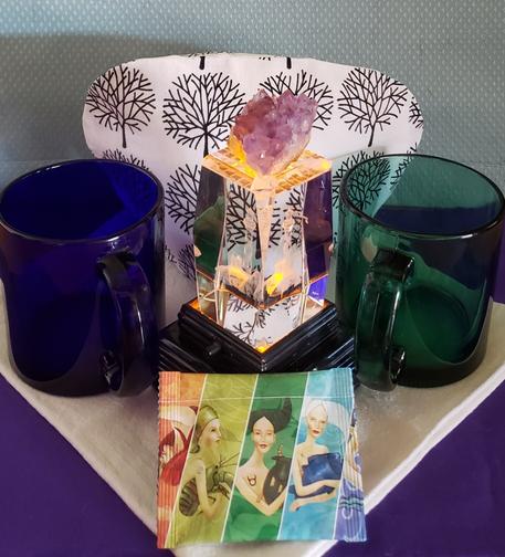 A tea tableau in emerald, cobalt, and amethyst, with Adagio tea.