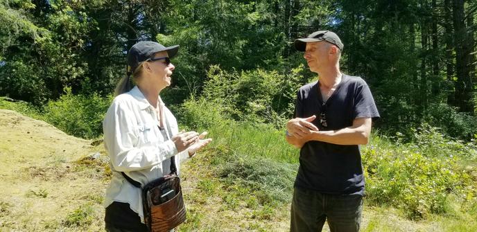 Julie talking to Tim, resident caretaker.