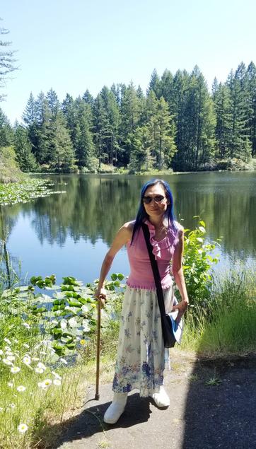 Jim took this photo of me in front of the lake. Beside the nature house.