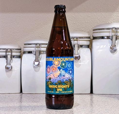 Bottle of Basic Rights IPA, a collaboration beer brewed by Double Mountain Brewery of Hood River, Oregon, with Basic Rights Oregon, an organization dedicated to advocacy for LGBTQ2SIA+ rights throughout the state of Oregon