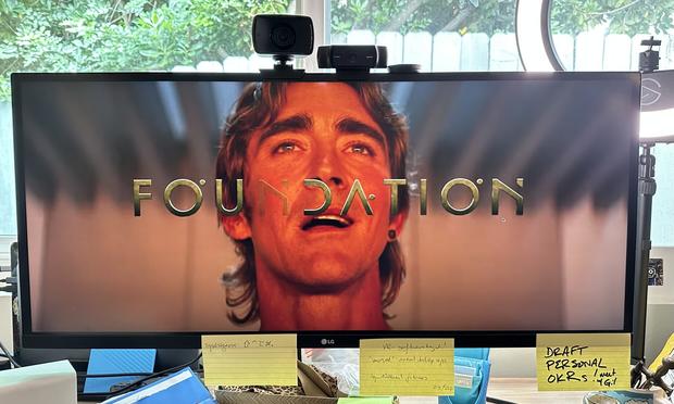 Photo of a 2.35:1 format video filling my equally wide screen