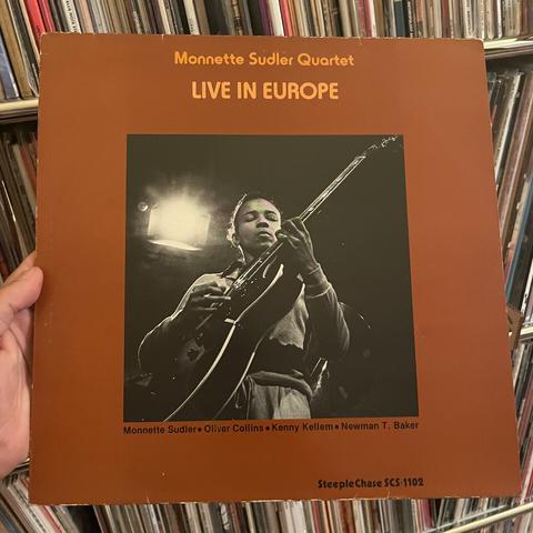 Monnette Sudler's Live In Europe record cover, with a photo where she is seen playing her guitar.