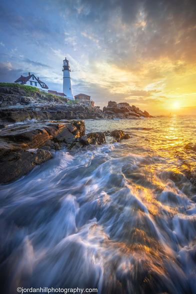 A stunning sky at sunrise at the Portland Head Light.