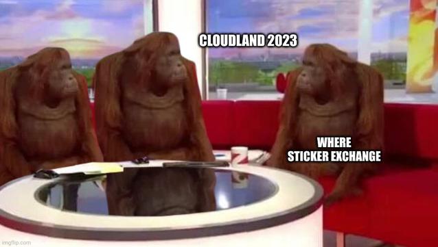 monkeys sitting at CloudLand 2023 table. Monkey on the right asking "where sticker exchange"