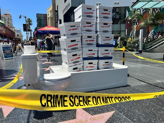 The Hollywood walk of fame star of the former prez has been decorated with a toilet and bathtub loaded with boxes marked "classified." Also, crime scene tape surrounds the area.