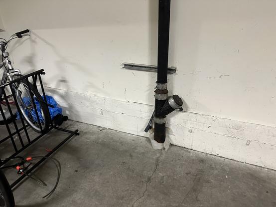 A garage with empty bike racks