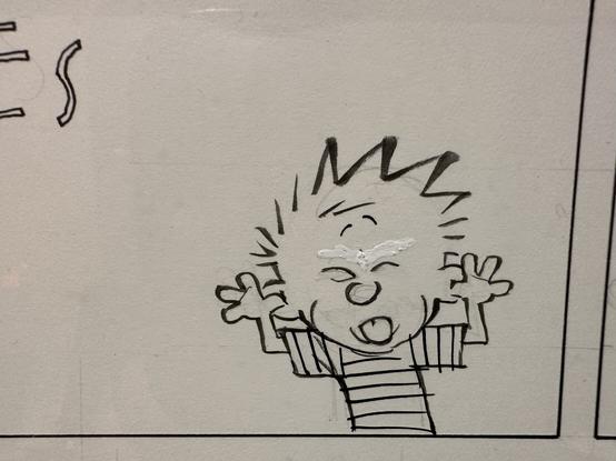 Calvin sticking his tongue out. Original eyebrows were covered up with Wite-Out