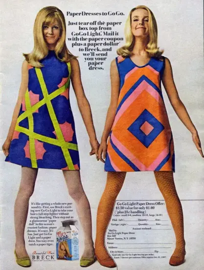 Two blonds in very mod dresses from the 60s. Super crazy patterns.