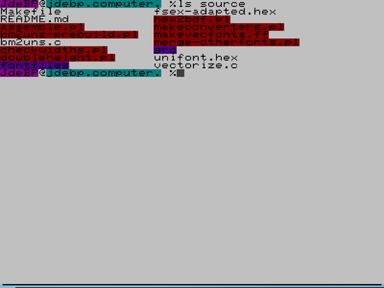 A screen dump of a virtual terminal showing a couple of coloured shell prompts and the output of the ls command, on a white background.  The font is PET from Unscii.