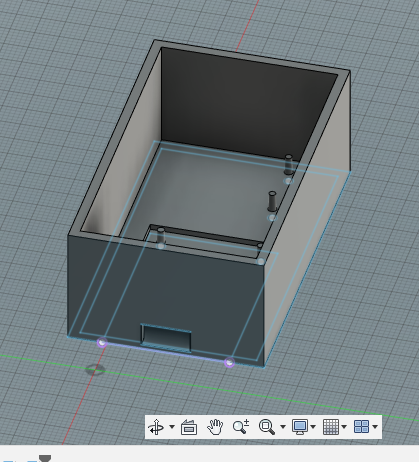 A screenshot of Fusion360 showing a simple grey box with a few pegs and a cutout for power.