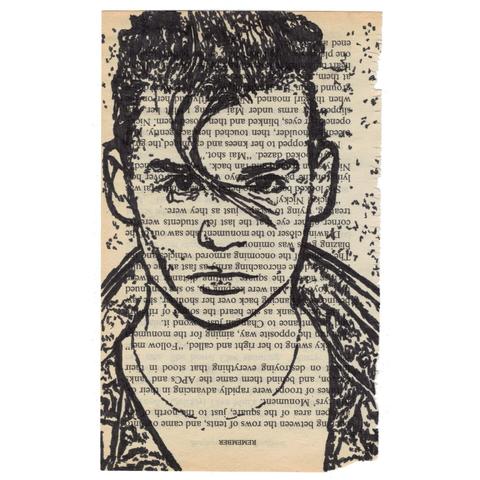 Pen drawing of Johnny Depp as a 50s greaser drawn on a torn-out book page.