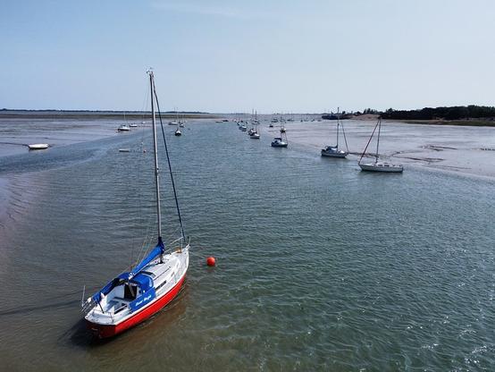 Yachts moored in Broom Channel, Langstone Harbour.