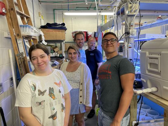 Science crew in the USF aquarium room