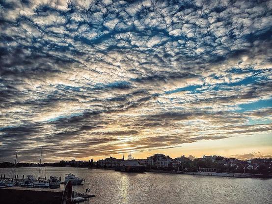 A dramatic sky during a sunset in Wilhelmshaven, Germany.
