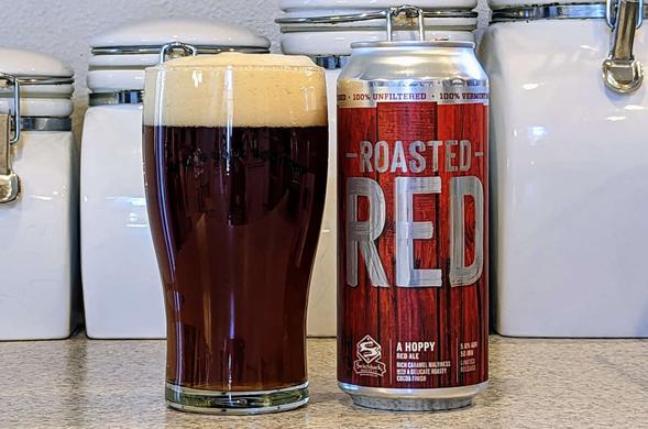 Glass and can of Roasted Red, a hoppy red ale with a darker red-brown appearance, from Switchback Brewing of Burlington, Vermont
