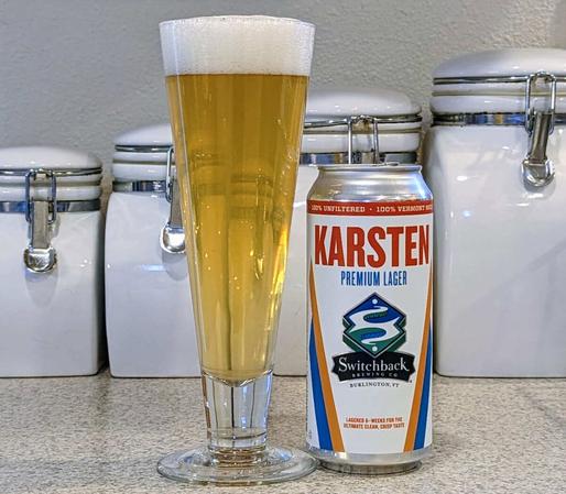 Glass and can of Karsten Lager from Switchback Brewing of Burlington, Vermont