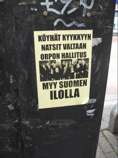 juliste: KÖYHÄT KYYKKYYN NATSIT VALTAAN ORPON HALLITUS MYY SUOMEN ILOLLA. kuva orpon hallituksen ministereistä.