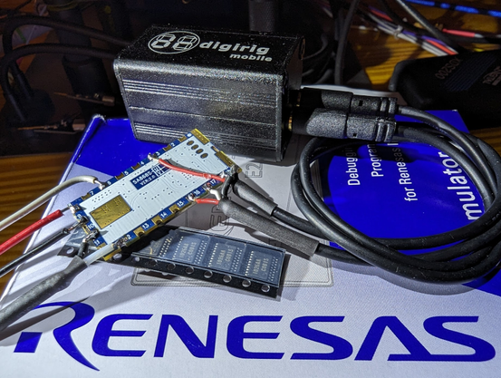 A photograph of a NiceRF SA868S module with various wires directly soldered to it, including two cables plugged into an adjacent "digirig mobile" device.
