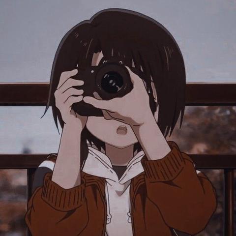 Foto anime de una chica con una cámara de fotos