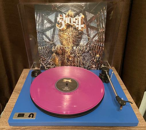 Turntable playing the orchid colored vinyl of Impera by Ghost.