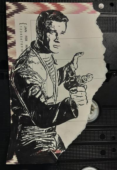 Pen drawing of a retro-futuristic space man looking stoic and holding a laser gun drawn on a torn weekly planner sheet.