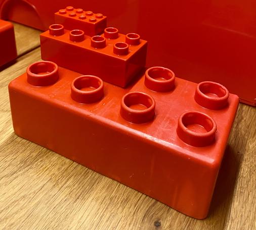 Stacked lego duplo and quatro bricks. Excellent clutch power