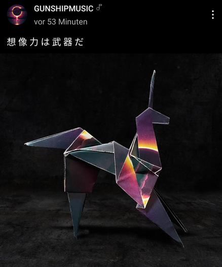 The album cover is folded like an origami unicorn.