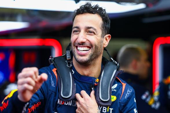 Daniel Riccardo in Red Bull regalia, after a tyre test in Silverstone, smiling as always.