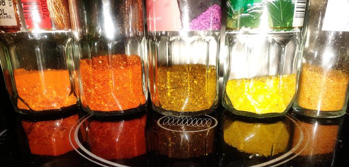 Chili powder from left to right:
Caribbean Habanero red
Carolina Reaper red
Jamaican Hot Chocolate light brown
Lemon Drop bright yellow
Thai Chili orange