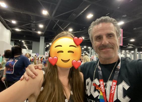 A selfie of two people facing the camera - me with an emoji over my face and Con O'Neill