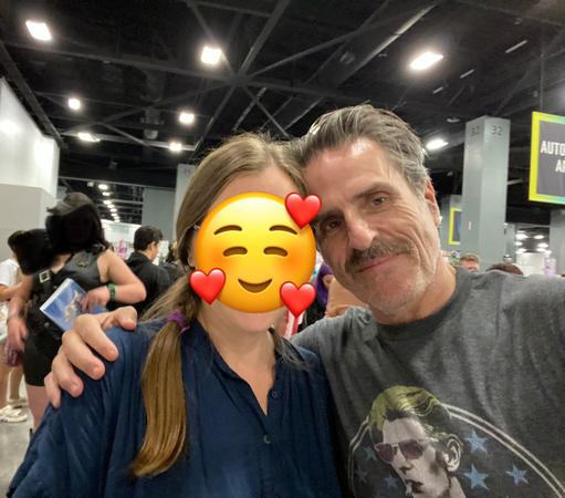 A selfie of two people facing the camera - me with an emoji over my face and Con O'Neill