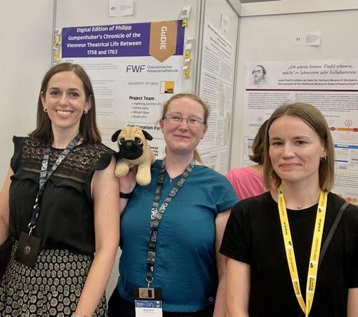 Three Poster authors and their poster: Ingeborg Zechner, Rudie (the project pug) Mirijam Beier, Selina Galka