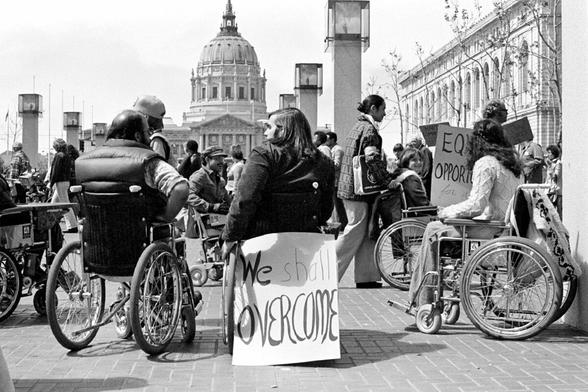 Black & White image with We shall overcome sign