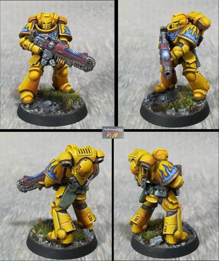 Hellblaster Space Marine. Bright yellow armour with blue flame details.