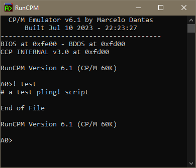 Screenshot of "RunCPM" terminal and minimal CP/M program transcript:

"""
RunCPM Version 6.1 (CP/M 60K)

A0>! test
# a test pling! script

End of File
"""
