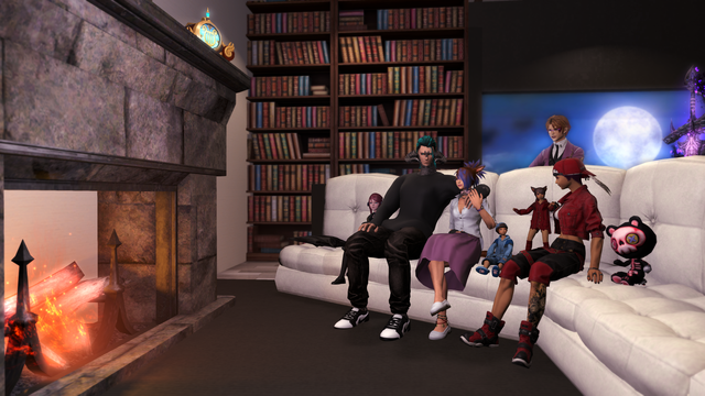 The Stormwolf family. From left to right: Lily, Geras, Joan, SERA (above Joan), Noah, LJ (above Noah), Lillian, and Venny. Picture is taken from the right side and is zoomed out so that the home's fireplace is visible on the left side of the image.