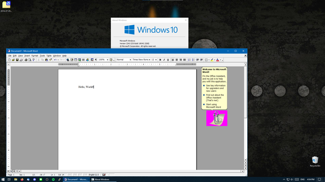 My Windows 10 build 22H2 Desktop, showing a running instance of Word 2000  in the foreground, and the "about windows" Dialog behind it, showing that this is running on windows 10